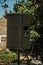 Black speaker on a garden at the Roman Theater of Merida