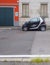 black special edition smart for two parked in the street