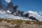 Black spiraling smoke plume in Mojave desert town, Pahrump, Nevada,USA