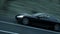 Black sport car on road, highway. Very fast driving. Dark environment. Super realistic 4K animation.