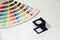 Black square Magnifying glass and Rainbow Sample Colors Palette Catalog.