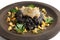 Black squid ink risotto with grilled calamary