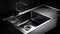 Black stainless steel kitchen sink with chrome faucet.