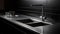 Black stainless steel kitchen sink with chrome faucet.