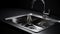 Black stainless steel kitchen sink with stainless steel faucet.
