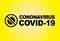 Black standard bold words coronavirus, covid-19 on yellow background