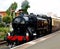 Black Steam Engine and Train at Kidderminster Station, Worcestershire England  