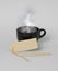 Black, steaming mug, price-tag in front of it.