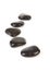 Black stepping stones in a row