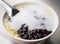 Black sticky rice and soybeans with coconut milk