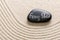 Black stone with the inscription Feng Shui