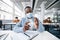 Black student applying antibacterial sanitizer on hands