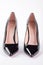 Black stylish leather female heels.