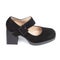 Black suede comfortable leather classic evening women& x27;s shoes with a strap on a thick square heel on a white