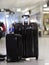 Black suitcases standing airport