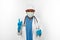 Black surgeon doctor man in white blue coat, gloves, white cap, surgeon mask makes attention gesture