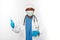 Black surgeon doctor man in white coat gloves white cap and surgeon mask makes thumbs up gesture