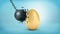 A black swinging wrecking ball breaks at collision with a giant intact golden egg.