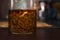 Black Tea Brewed in a Glass Jar on a Dark Colored Wooden Table. Tea Ceremony. Side View