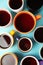 Black tea coffee in bright cups, office break, team building