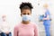 Black Teen Girl Patient Infected With Coronavirus Standing In Hospital