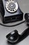 Black telephone with rotary dial