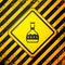 Black Tequila bottle icon isolated on yellow background. Mexican alcohol drink. Warning sign. Vector