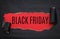 Black torn paper and text black friday