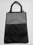 A black tote bag with a gray combination