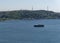 Black touristic travel ferry on the bosphorus sea