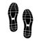 Black trace from shoes on white background