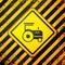 Black Tractor icon isolated on yellow background. Warning sign. Vector