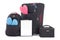 Black travel suitcases and backpack with clothing, checklist iso