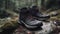 Black trekking boots on the rock