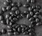 Black turtle beans on dark surface