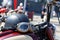 Black vintage moto helmet with glasses on motorcycle