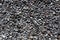 Black volcanic lava stones pattern texture