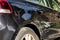 Black Volkswagen Golf scratched in traffic accident. The driver does not pay attention, the vehicle has also very old cracked