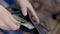 Black wallet with euro paper currency into counted by man hand.