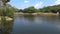 Black water pond on a sunny day. Mihintale, Sri Lanka