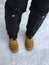 Black waterproof snow cover, Gaiters covering black ski pants tr