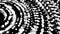 Black and white abstract circles of shimmering squares rotating endlessly. Animation. Abstract hypnotic spiral geometric