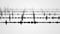 A black and white audio waveform spectrum visualization effect with multiple blurred tracks and dotted grid background.