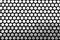 Black and white background of a grid of spotted. Pattern of round holes vintage style. Photo for web site slider.