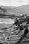 Black and white Beautiful vibrant Autumn landscape image looking from Pike O`Blisco towards Blea Tarn with beautiful sungiht on