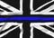 A black, white and blue waving Union Jack Flag in memorial of Police Officers that have died in the line of duty