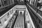 Black and White Chequered Tiled Floor in a Shopping Arcade.