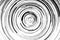 Black and white circular blur in the form of a whirl background texture, radial blur, abstract twist, funnel