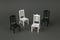 Black and white classic chairs on a gray background. The concept of organizing a meeting