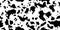 Black-white cowhide as a seamless texture. Spotted vector background